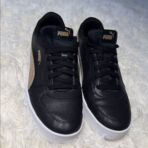 Puma Black Sneakers with Gold Highlights